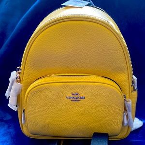Coach- Yellow small backpack/purse